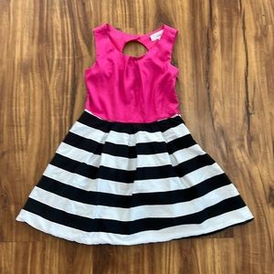 Cute Black and white dress with pink on the top and a little hole in the back